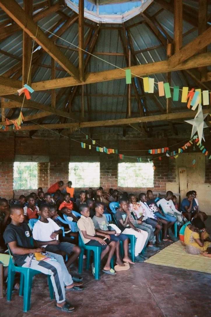 Young people and teenagers attending a lecture.